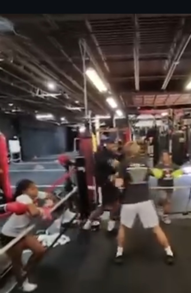Coach Jeff leading youth boxing training in the gym